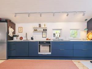 Køkken eller tekøkken på 6 person holiday home in Thisted + 35 billeder