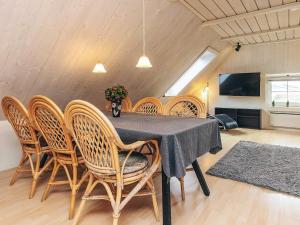 a dining room with a table and chairs at 6 person holiday home in Thisted in Thisted