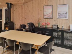 a meeting room with a table and chairs at Spacious Retreat by Limfjorden - By Traum Ferienwohnungen in Sillerslev
