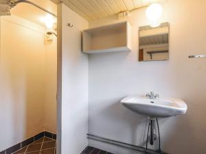 a bathroom with a sink and a mirror at Panoramic View Fisherman's House - By Traum Ferienwohnungen in Vesløs +27 photos