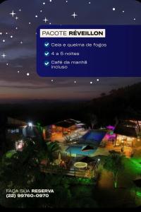 a screenshot of a webpage of a resort at night at Estação Serramar in Lumiar