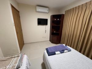 Una cama o camas en una habitación de Sur Backpackers 86 fotos más