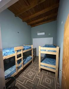 Ένα ή περισσότερα κρεβάτια σε δωμάτιο στο Casa Quinta en Paso de La Patria Corrientres Argentina