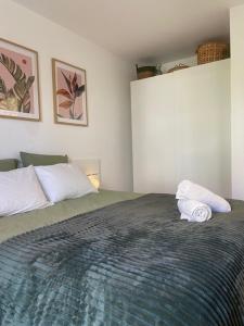 Postel nebo postele na pokoji v ubytování Studio Premium Haguenau cosy, tout équipé, calme, balcon