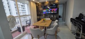 TV a/nebo společenská místnost v ubytování Lujoso apartamento Villeta Cundinamarca