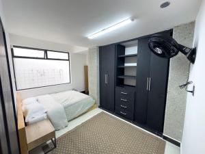 Katil atau katil-katil dalam bilik di Casa Cubo Marsella