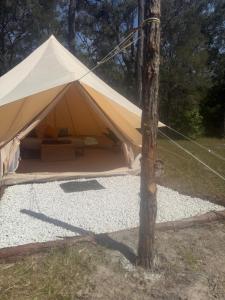 a canvas tent with a bed in it at Ventricosa Jervis Bay in Tomerong