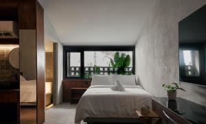 Postel nebo postele na pokoji v ubytování Bishop House