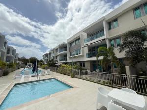 Πισίνα στο ή κοντά στο BrandNew Isla Verde Condo Near Beach, Airport-Pool - Solemare II