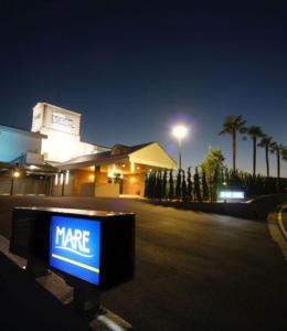 a mare sign in front of a building at night at Hotel Mare - Vacation STAY 24956v in Kure
