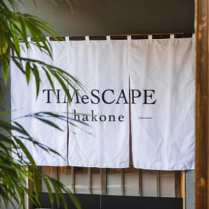 a white curtain with the words insurance cape haveorne on it at TIMeSCAPE -hakone- in Miyanoshita