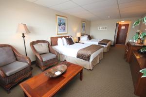 Postel nebo postele na pokoji v ubytování St Andrews Inn & Suites