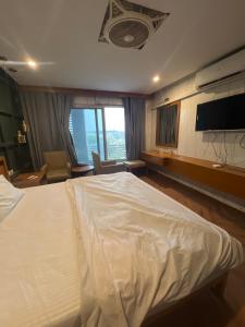 Katil atau katil-katil dalam bilik di Grande luxury apartment