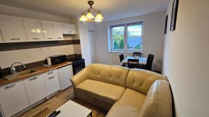 Η κουζίνα ή μικρή κουζίνα στο Apartament Antoni +12 φωτογραφίες