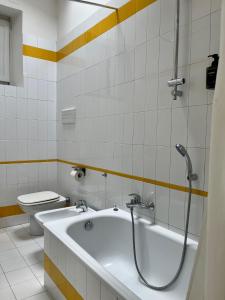 O baie la Paula City Apartment