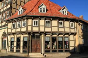 an old building with a red roof at Klopstock´s Herberge in Quedlinburg