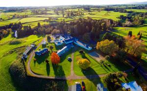 an aerial view of a house in a park at Okoroire Hot Springs Hotel in Okoroire