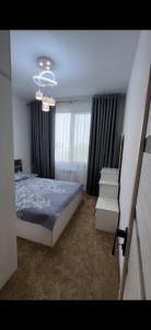 Postel nebo postele na pokoji v ubytování Olmazor comfort