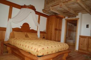 En eller flere senge i et værelse på Residenza La Corte Dei Toldi