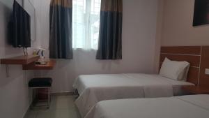 Katil atau katil-katil dalam bilik di DOTA Hotel +2 gambar