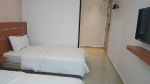 Katil atau katil-katil dalam bilik di DOTA Hotel