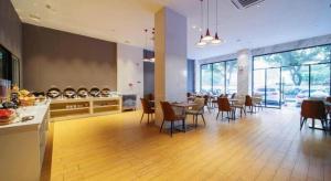 Posezení v ubytování Borrman Hotel Zhaoqing Sihui Tianguangxu Jade City