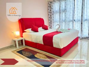 a bedroom with a red bed with a swan on it at IdamanKu Comfort Apartment - HYVE SOHO Cyberjaya in Cyberjaya +29 photos