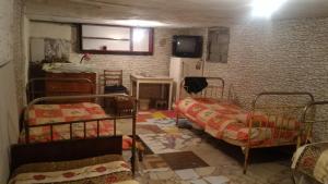 Postel nebo postele na pokoji v ubytování Lemon Family GuestHouse