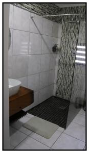 a bathroom with a shower and a sink at brand st 95 in Brandfort