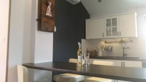 Kuchyň nebo kuchyňský kout v ubytování Apartment Diminic Melin