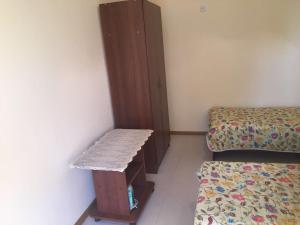 Postel nebo postele na pokoji v ubytování Гостевой дом Солнечный Холм
