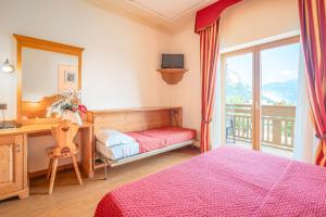 Postel nebo postele na pokoji v ubytování Hotel Fai