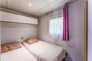 Postel nebo postele na pokoji v ubytování Évasion Nature à Parentis + 17 fotografií