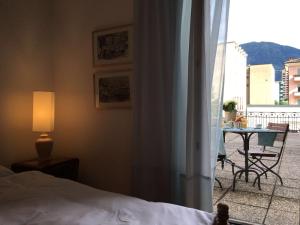 Postel nebo postele na pokoji v ubytování Bottega del Vino Guesthouse