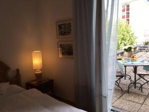 Postel nebo postele na pokoji v ubytování Bottega del Vino Guesthouse