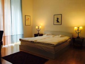 Postel nebo postele na pokoji v ubytování Bottega del Vino Guesthouse