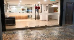 a large room with a kitchen and a living room at Hotel LoLex Kuchai Lama in Kuala Lumpur