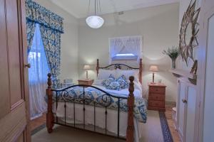 Ένα ή περισσότερα κρεβάτια σε δωμάτιο στο Tanunda Cottages