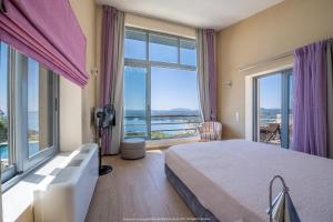 Ένα ή περισσότερα κρεβάτια σε δωμάτιο στο Kastraki Epavlis +70 φωτογραφίες