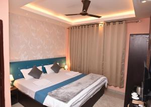 Ένα ή περισσότερα κρεβάτια σε δωμάτιο στο Hotel Hill View