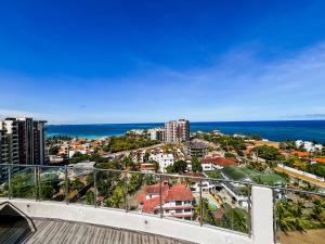 a view of the ocean from the balcony of a building at Eliana's nyali 3 min to the beach homes in Mombasa