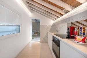 Nhà bếp/bếp nhỏ tại Luxury Rooftop Piazza Erbe Verona