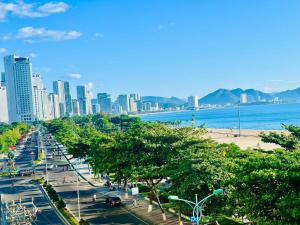 a view of a city with a beach and buildings at Imperial Nha Trang in Nha Trang