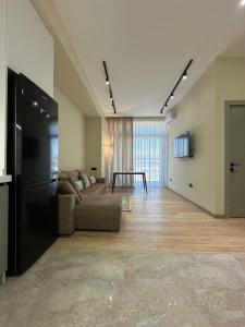 TV a/nebo společenská místnost v ubytování Sea Breeze, Polo Residences + 6 fotografií