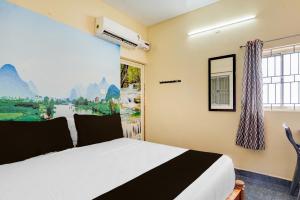 Postel nebo postele na pokoji v ubytování Super Hotel O Karanodai Formely AVR Rooms