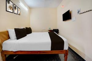 Postel nebo postele na pokoji v ubytování Super Hotel O Karanodai Formely AVR Rooms