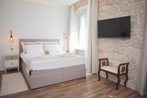 Postel nebo postele na pokoji v ubytování Apartment Barone