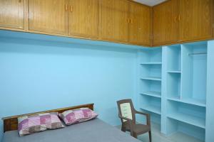 Postel nebo postele na pokoji v ubytování Shree chendur Rooms