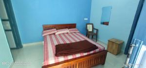 Postel nebo postele na pokoji v ubytování Shree chendur Rooms + 24 fotografií