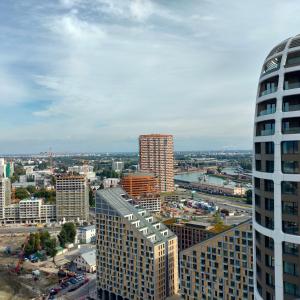 an aerial view of a city with tall buildings at Sky Park 26th floor free parking free Wi-Fi in Bratislava +2 photos